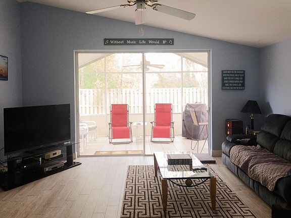 3rd image of 3409 SW Pindo Palm Ln