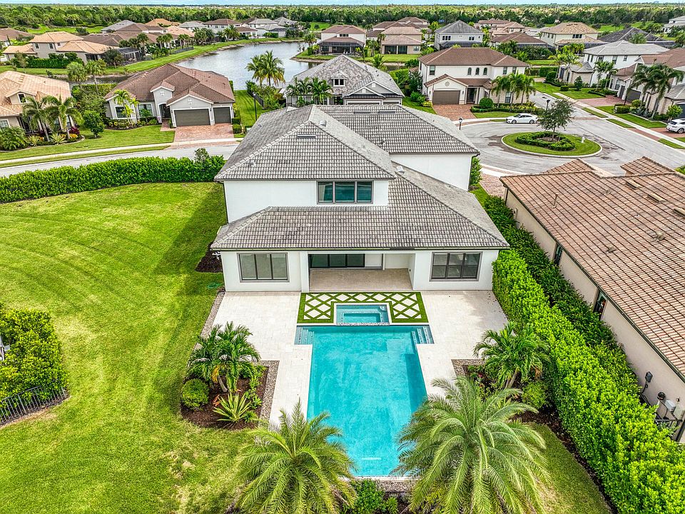 Aerial view of 102 Cerulean Key Way, a luxury estate in Sonoma Isles, Jupiter, Florida