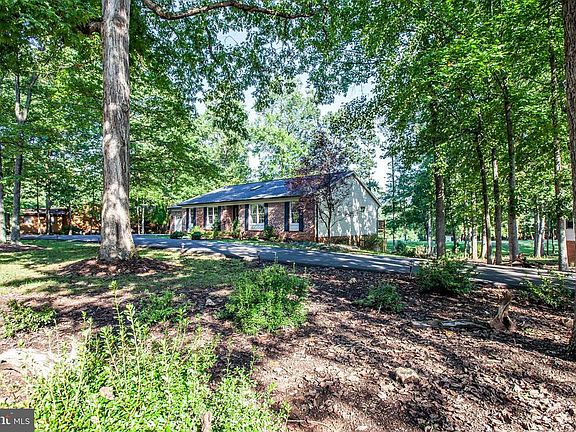 Tucked back in the trees.