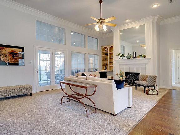 Spacious Front Living Room with Fireplace and Lots of Light!