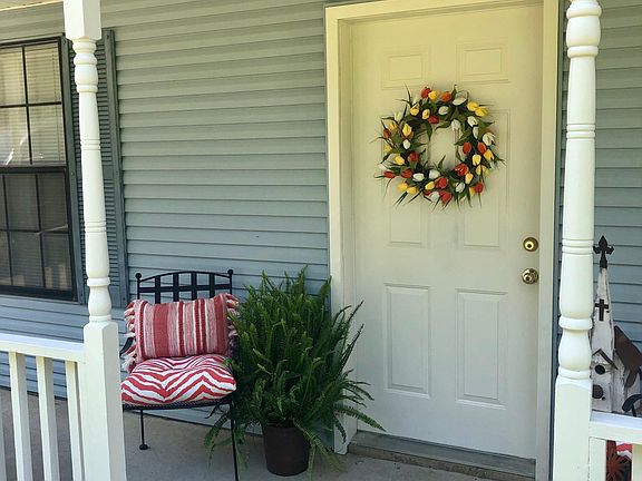 Shady front porch recently painted