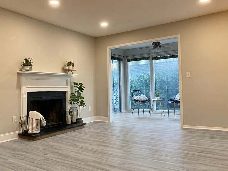 Livingroom with gas fireplace and new floors