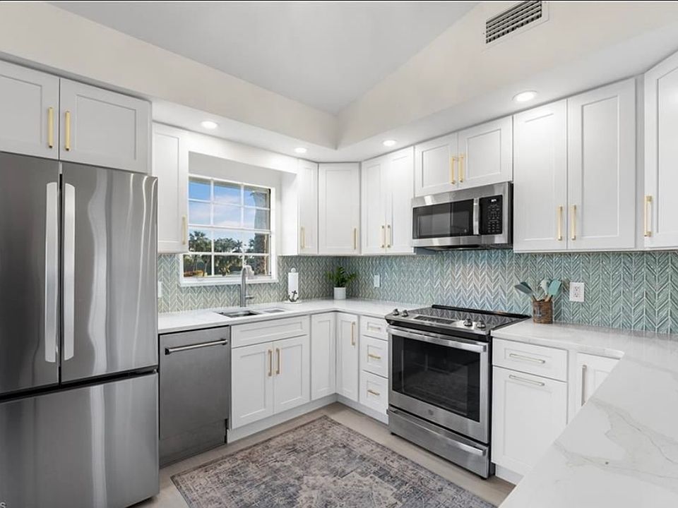 Kitchen with lake and golf course view from the window