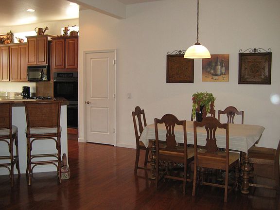 Dining area, gleaming hardwood floors!