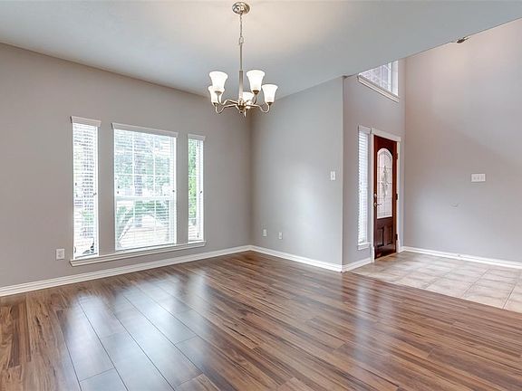 Formal Dining with huge space to accommodate  a large Dining Table, also new Light fixture