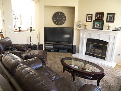 Casual Family room with Media niche and Fireplace