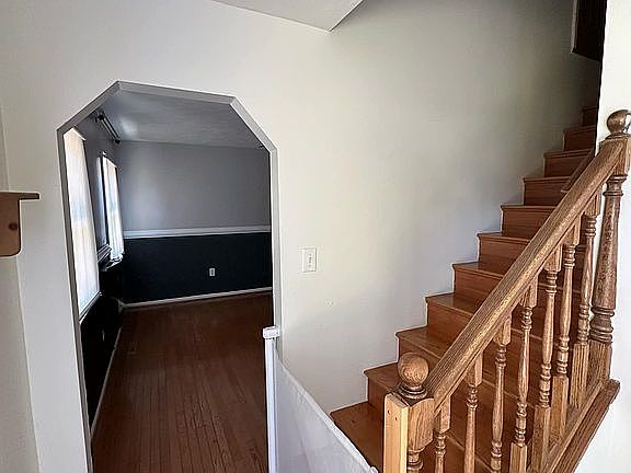 Entry way stairs/office left