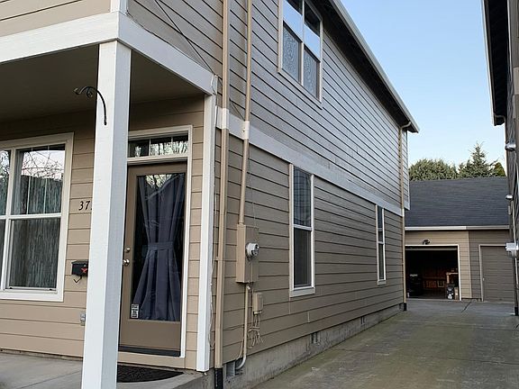 Detached garage and off street parking in the back.