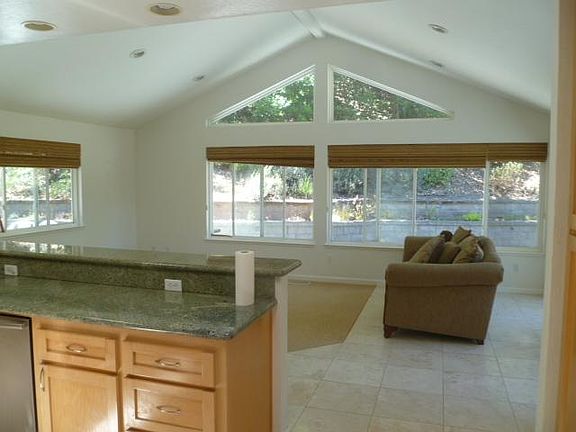 Expanded family room with vaulted ceilings