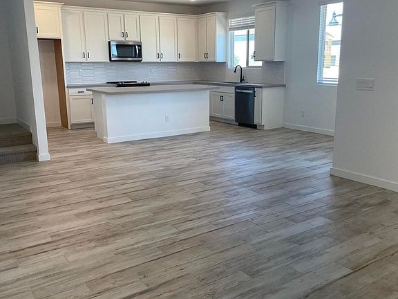 4th image of 15031 W DESERT BLOOM Street