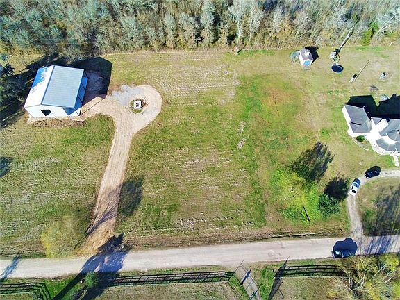 Beautiful 2 Acre lot with extra large metal building