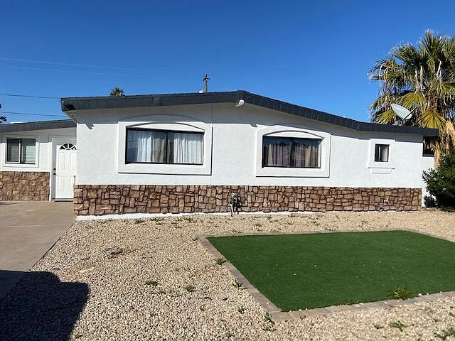 Freshly Painted House with Centered Turf