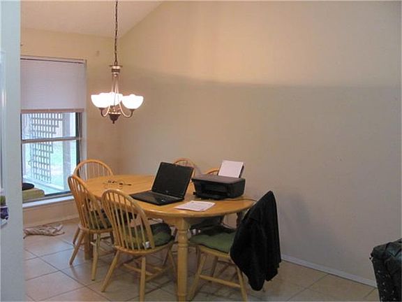 Dining area looks out to the backyard