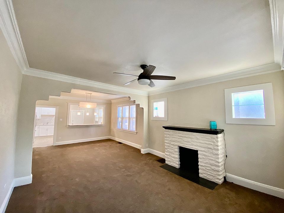 From front door 14' x 26' living and dining room, with high top bar.