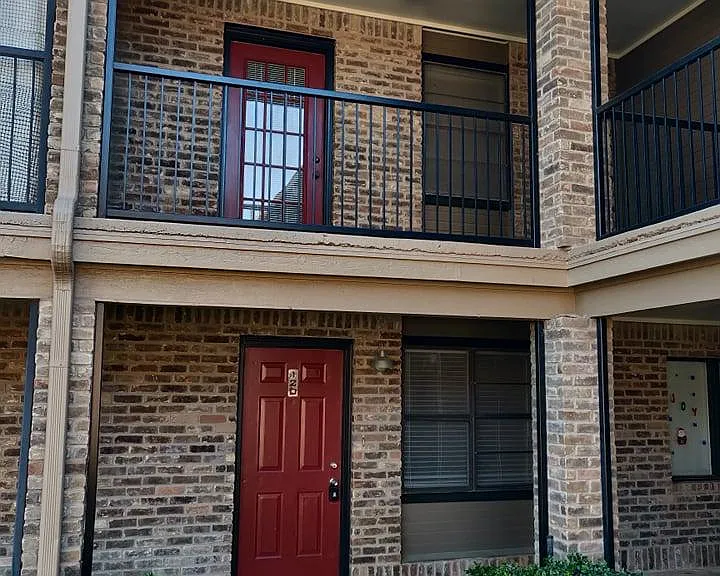 Entrance. One upper bedroom has a large balcony.