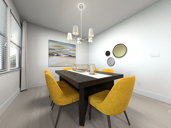 The open-concept floorplan allows for an easy flow between the kitchen and dining areas.