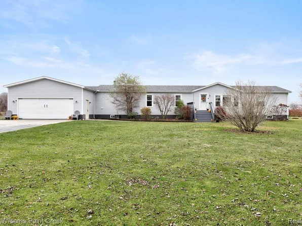 9255 Lambs Rd, Wales, MI 48027