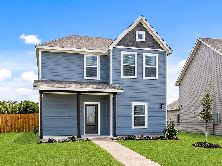 The Dogwood is a beautiful two-story siding home.