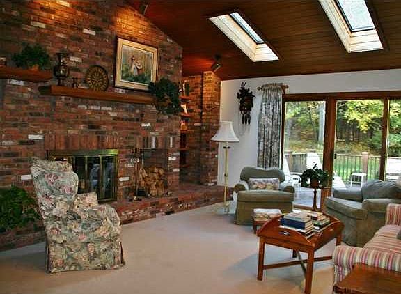 Family Room wth Double Sided Brick Fireplace