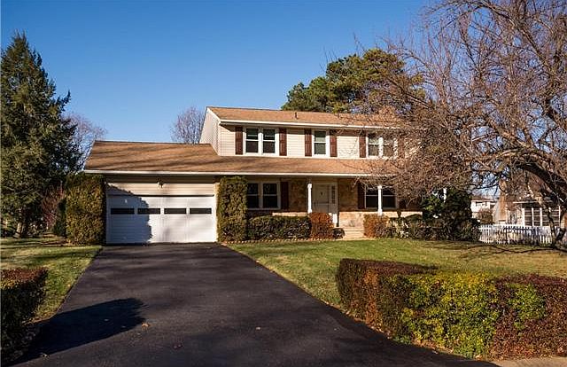 4 BR, 2.5 BA stone colonial: .55 acres & 2-car grg