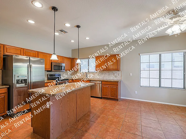 16021 W Custer Ln — Photo 11
