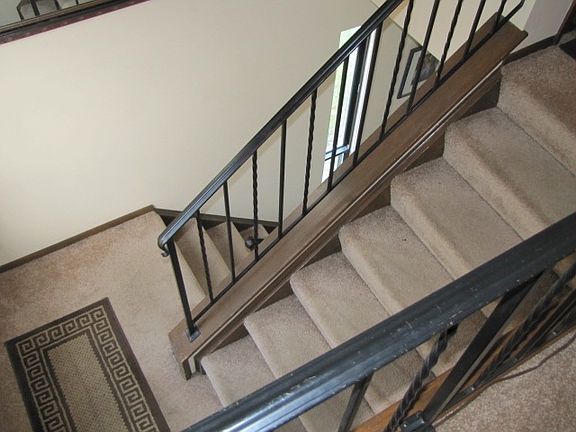 Stairway to second floor condo