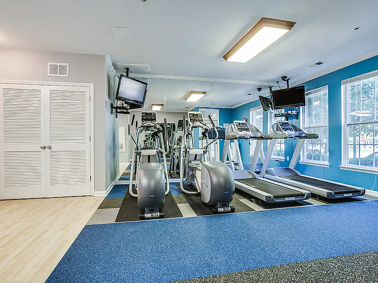 Fitness center with treadmills, machines and free weights
