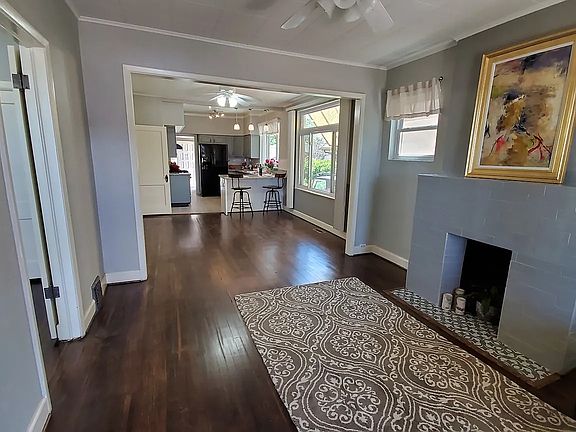 LIVING AND DINING ROOMS INTO KITCHEN