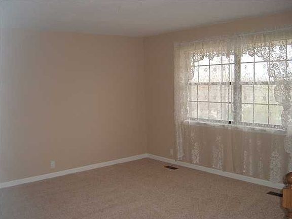 living room with new carpet and paint