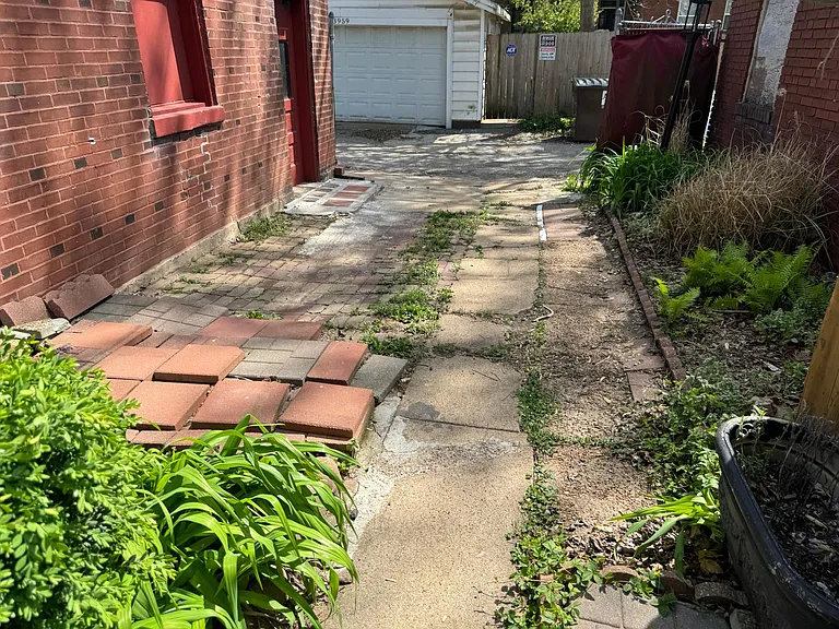 Arsenal Back Yard Parking Pad - Photo taken 4-12-24.