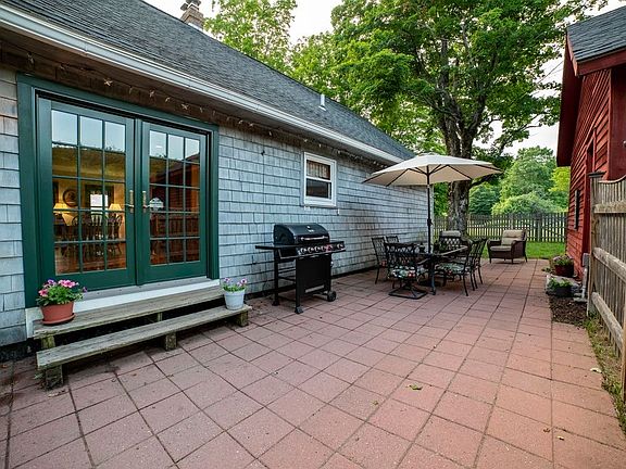 Fenced in back yard is perfect for pets and patio designed to enjoy the sights and sounds on nature.
