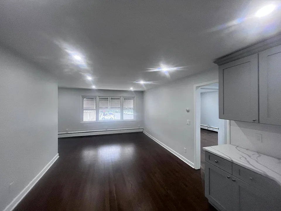 Open concept kitchen into living room/dining room.