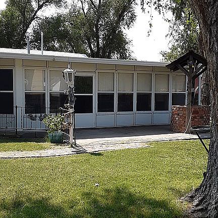 East entrance/enclosed patio