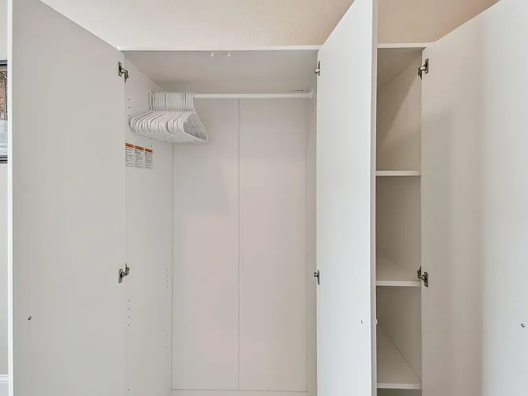 Armoire for hanging clothes and storage