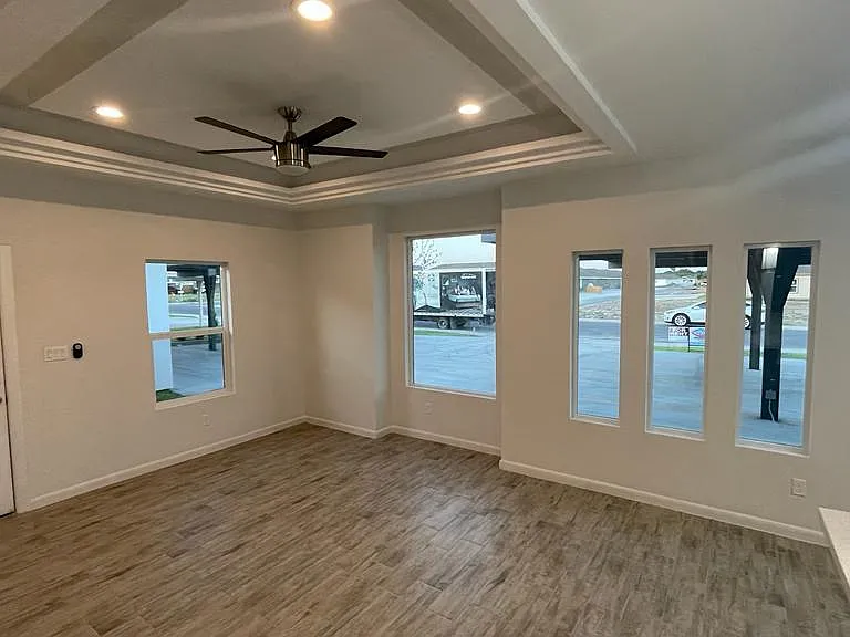 Custom blinds to be installed in all units. This unit is the 2 bedroom 2 bath with remote control modern fans in all rooms.