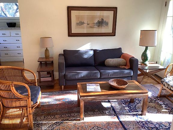 Living room in AM light (8:30am in February), looking from bathroom and bedroom wall
