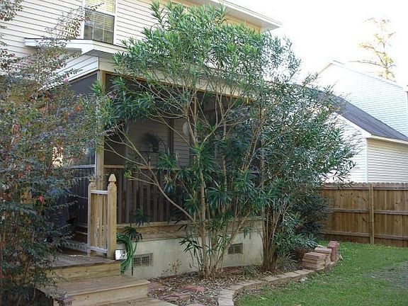 View of Screened Porch from Back of Yard