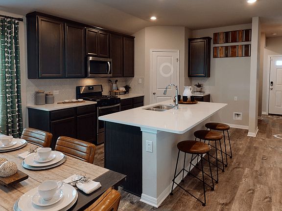 Cook delicious meals in the gourmet kitchen.