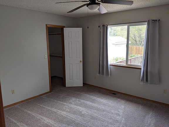 Upstairs Bedroom. Both upstairs rooms have walk in closets, and ceiling fans.