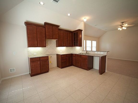 From the breakfast area, notice the flow of this open floor plan.