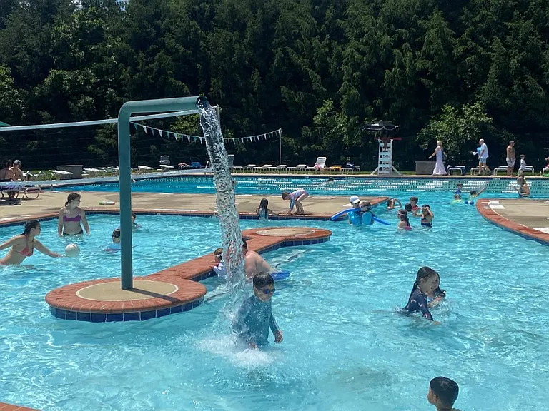Avenel Community pool includes kiddie pool, olympic size competition pool, and water features