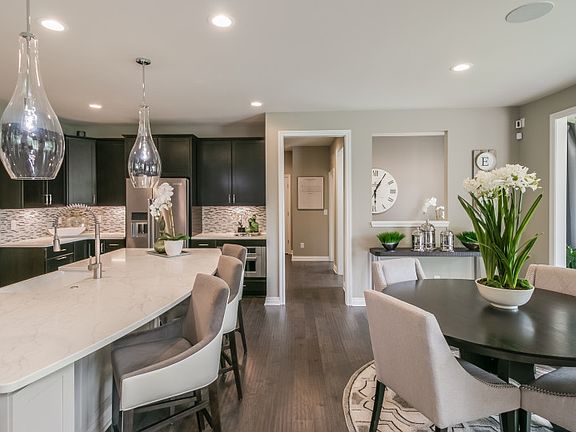 Kitchen Open to Cafe Breakfast Area