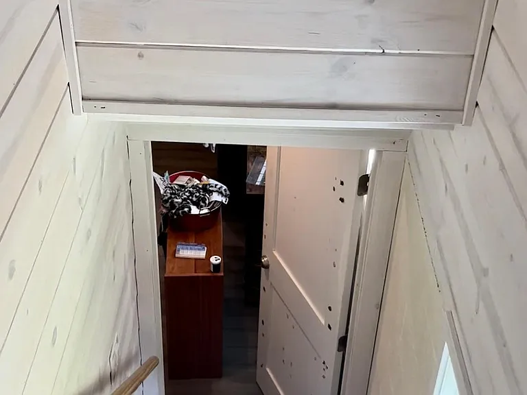 The door at the bottom of the stairs can be locked to give the downstairs unit some privacy, or removed to open up the house!