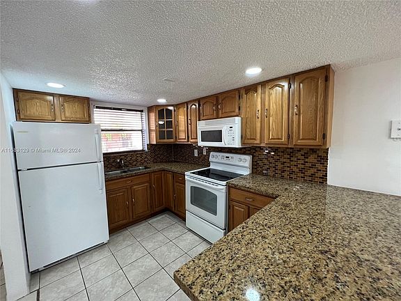 5th image of 5525 W 26th Ct APT 208