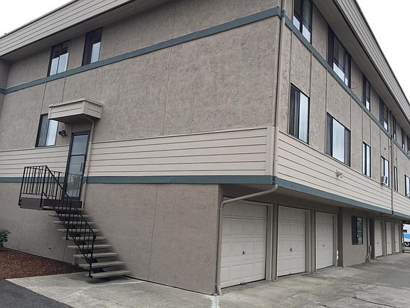 West side of building and garages