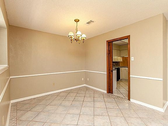 FORMAL DINING AREA ~ OPENING TO KITCHEN ~