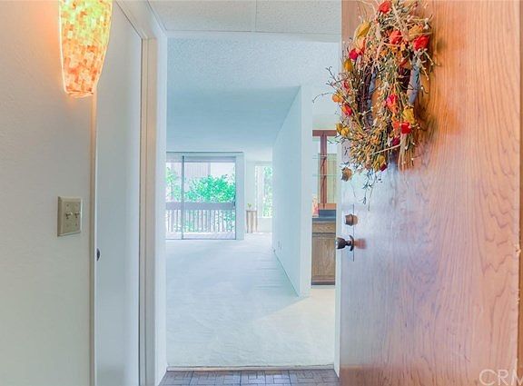 Enter the secured complex and take the elevator to this turnkey, spacious, interior unit.