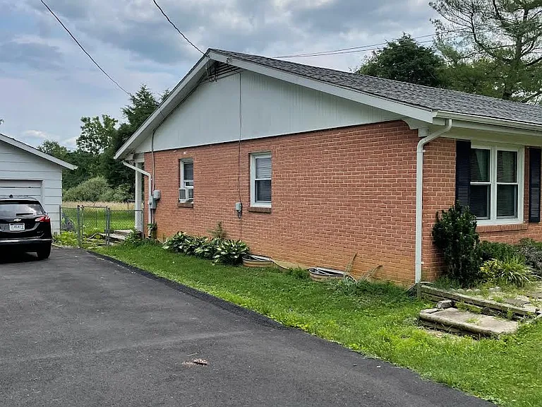 Parking area next to house