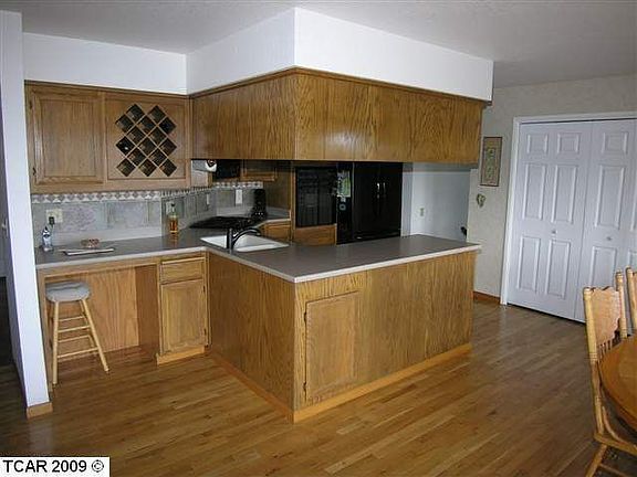 Kitchen area with breakfast bar