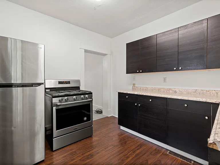 Updated Kitchen featuring stainless steel appliances, sleek cabinets and great counter space.